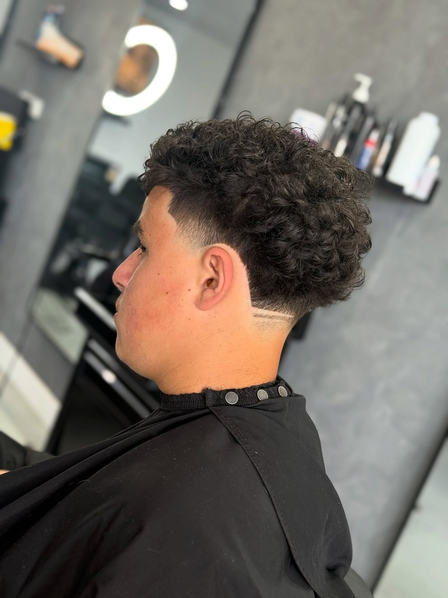 Curly top with faded sides