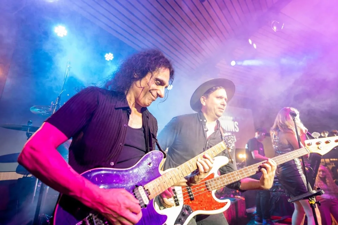 Guitarist under pink light