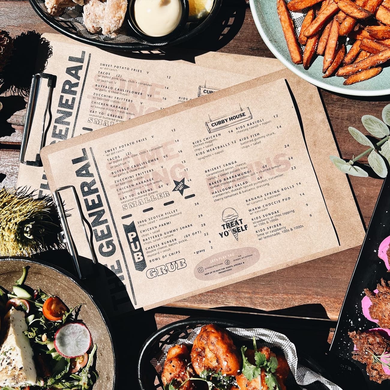 A spread of The General dishes laid over the printed General menu