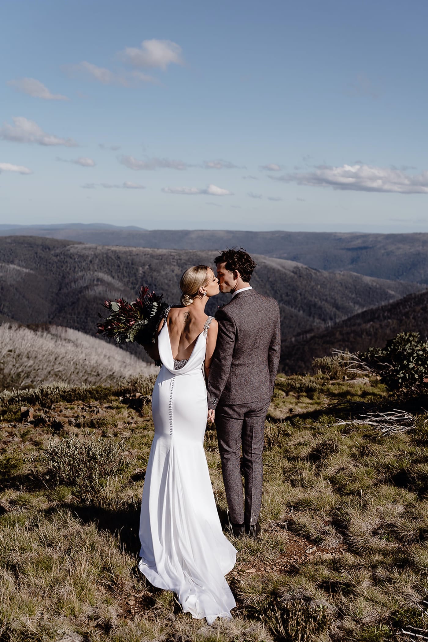 A couple on their wedding day above the Mt Hotham high plains